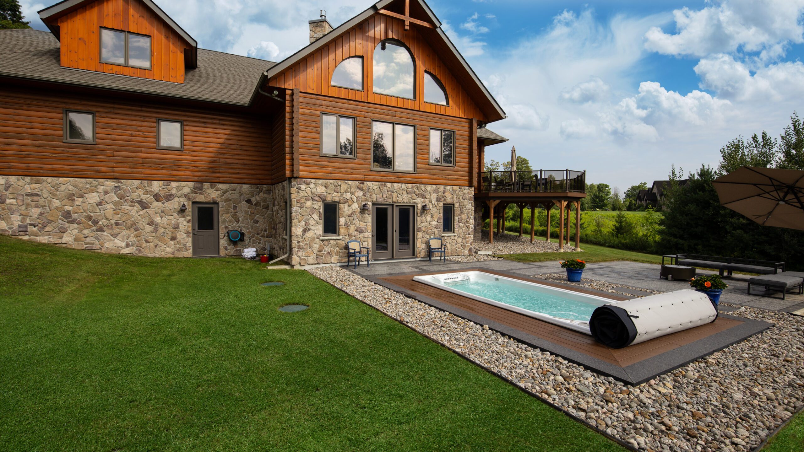 Backyard design with Swim Spa - Lunar Lagoons Ohio